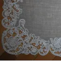 Preview of a cutwork napkin project embroidery design featuring intricate snowflake motifs.