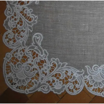 Preview of a cutwork napkin project embroidery design featuring intricate snowflake motifs.