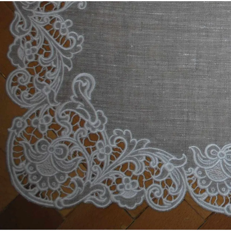 Preview of a cutwork napkin project embroidery design featuring intricate snowflake motifs.