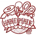 Handmade redwork embroidery design featuring intricate stitching patterns suitable for various crafts.