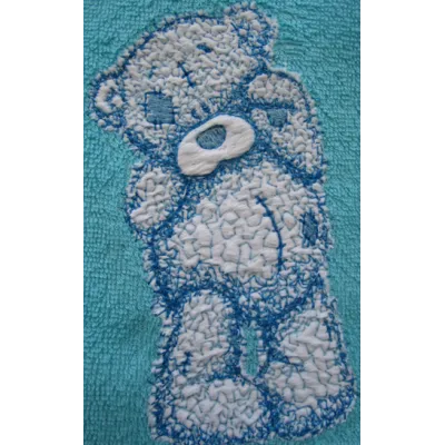 Teddy bear applique embroidery design featuring a cute and cuddly bear motif for creative stitching projects.