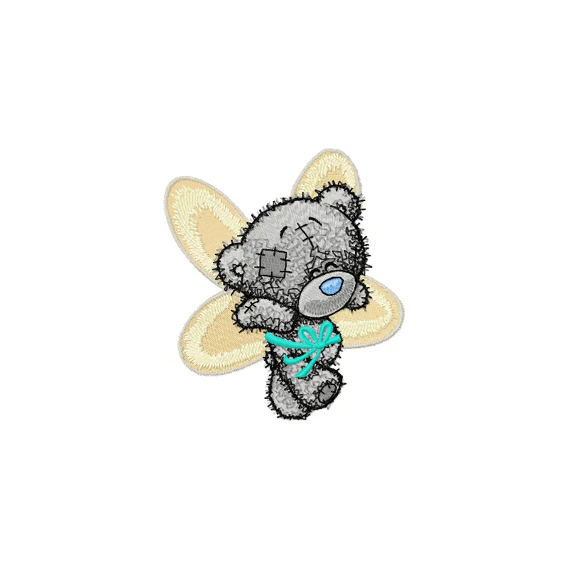 Teddy Bear can fly embroidery design featuring a whimsical bear with wings, perfect for children's items.