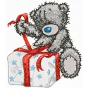 Teddy Bear Christmas is Coming embroidery design featuring a cute teddy bear adorned with festive elements.