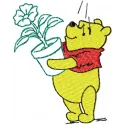 Embroidery design featuring Winnie Pooh holding a flower, ideal for stitching on t-shirts or baby onesies.