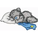 Teddy bear sleeping embroidery design showcasing a cozy and adorable stitched motif for various fabric projects.
