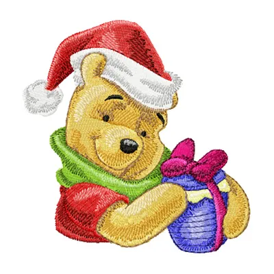 Winnie the Pooh holding a Christmas gift, showcasing a charming embroidery design for festive projects.
