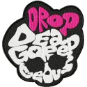 Preview of Monster High badge embroidery design featuring skull and bones, ideal for creative stitching projects.