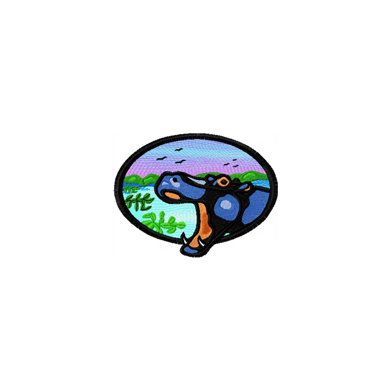 Hippo and savanna embroidery design showcasing a playful hippo in a vibrant landscape, ideal for travel-themed projects.