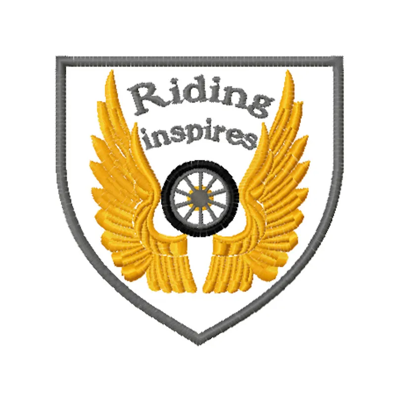 Riding inspires embroidery design featuring intricate stitching of a motorcycle and road elements.