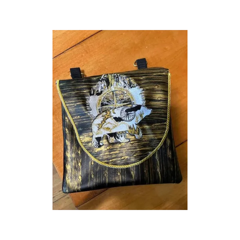 Embroidered bag with wild bear design