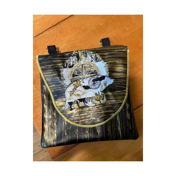 Embroidered bag with wild bear design