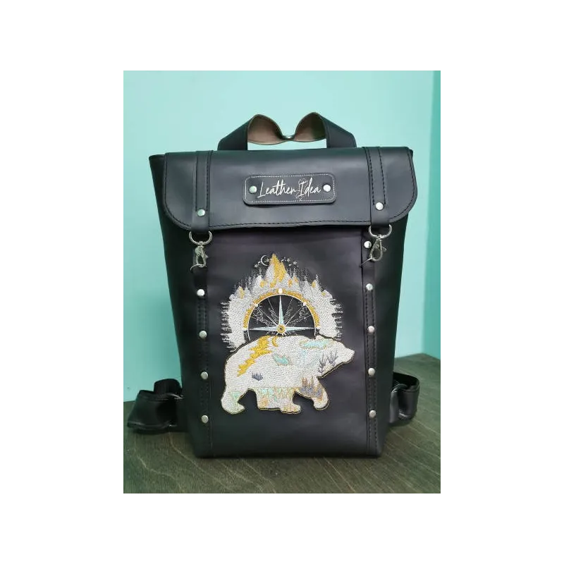 Backpack with embroidered bear design