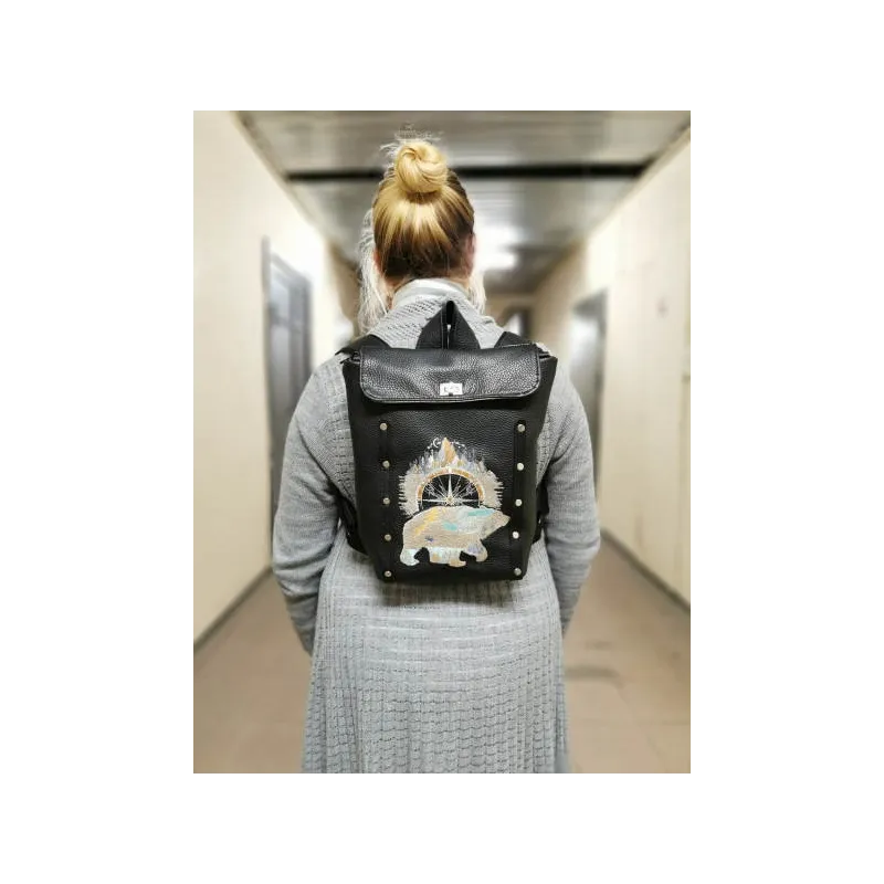 Leather backpack with polar bear design
