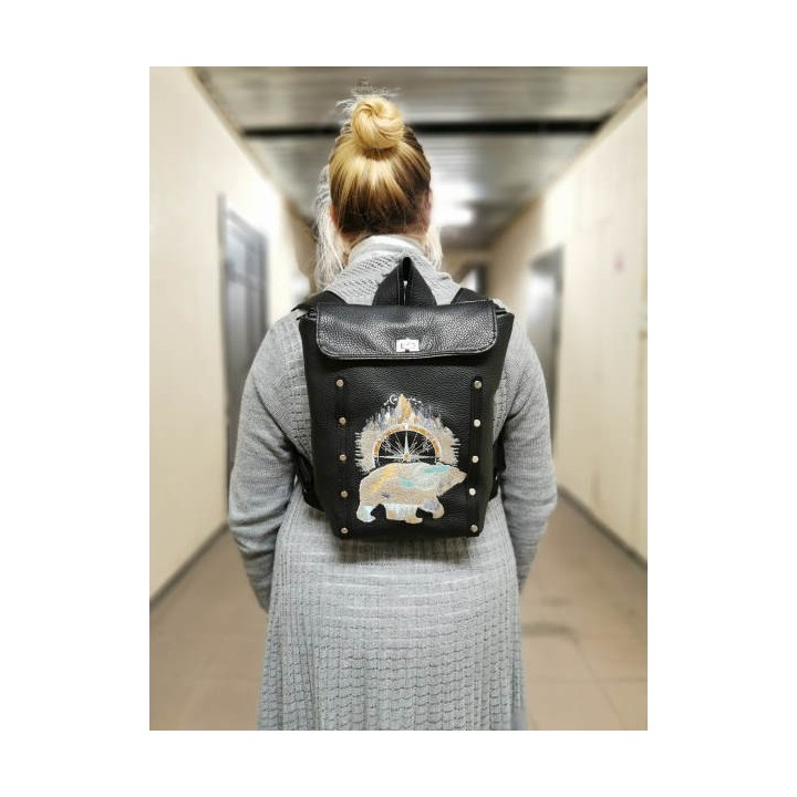 Leather backpack with polar bear design