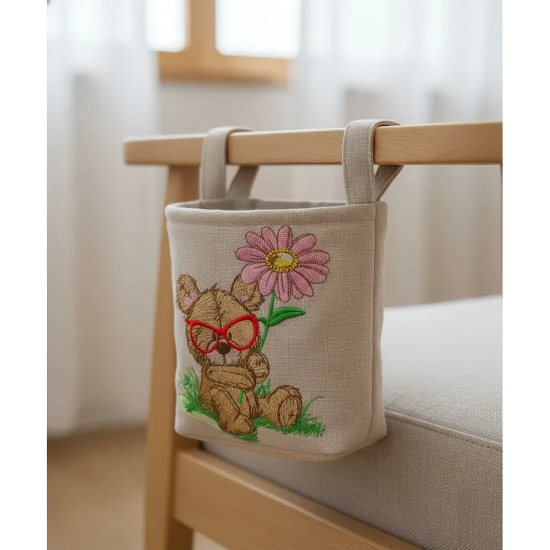 Intricat botanist embroidery design showcasing a teddy bear surrounded by plants and flowers.