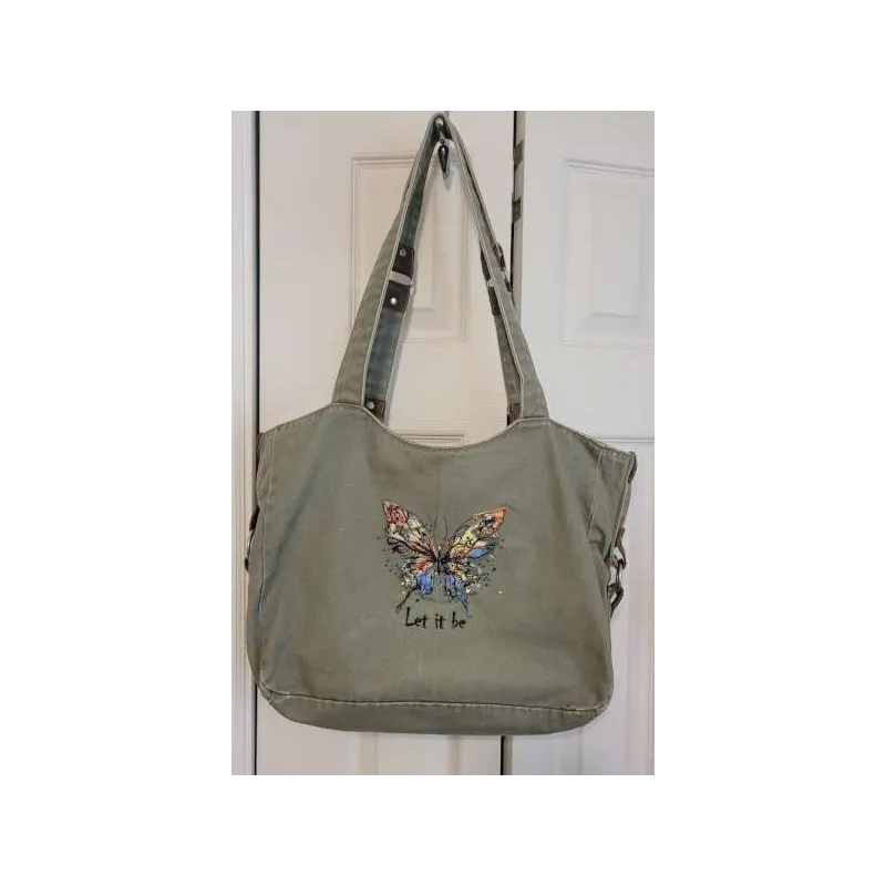 Preview of the Butterfly 'Let It Be' embroidery design, showcasing intricate stitching patterns ideal for various fabrics.