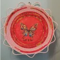 Butterfly 'Let It Be' embroidery design showcasing intricate stitching patterns for personalized projects.