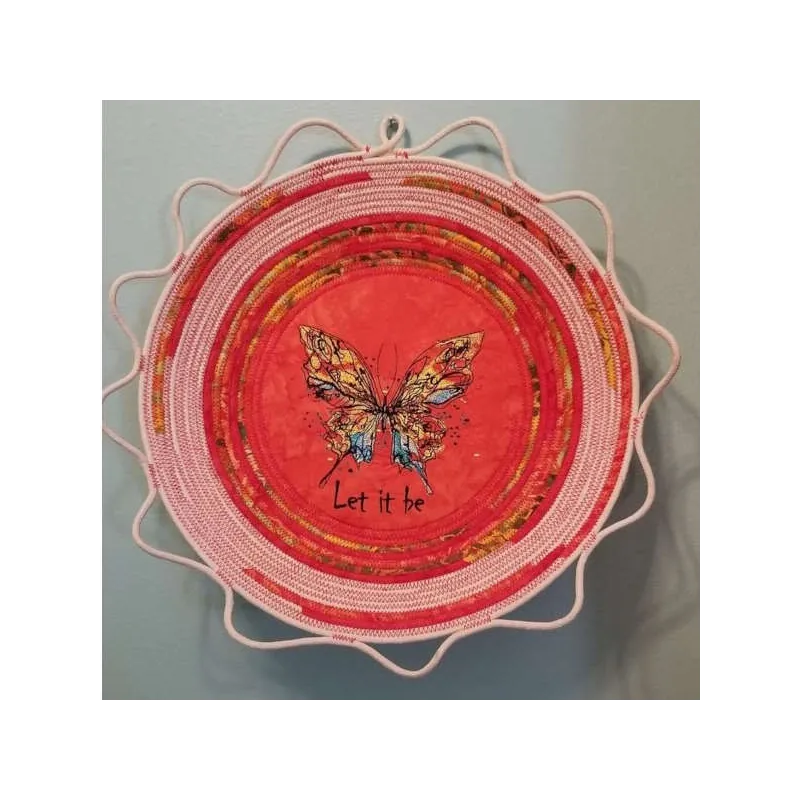 Butterfly 'Let It Be' embroidery design showcasing intricate stitching patterns for personalized projects.
