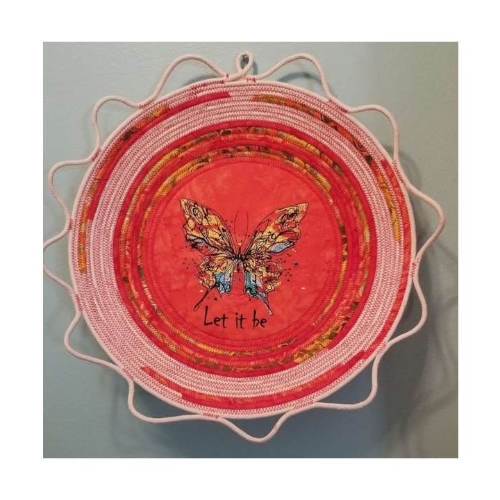 Butterfly 'Let It Be' embroidery design showcasing intricate stitching patterns for personalized projects.