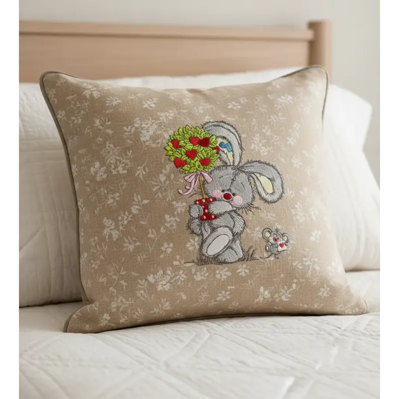 Closeup of Bunny and Mousekin Valentine's Day embroidery design, showcasing intricate stitching patterns for festive project…