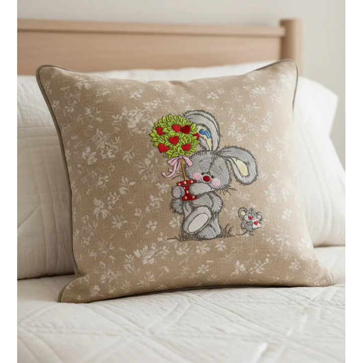 Closeup of Bunny and Mousekin Valentine's Day embroidery design, showcasing intricate stitching patterns for festive project…