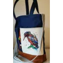 Bright birdie embroidery design showcasing a colorful bird motif, perfect for enhancing fabric projects.