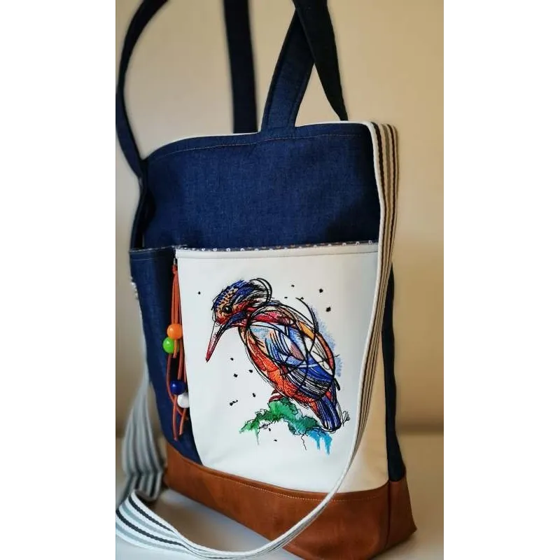Bright birdie embroidery design showcasing a colorful bird motif, perfect for enhancing fabric projects.
