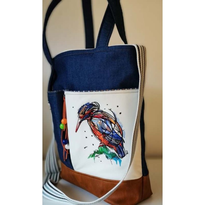 Bright birdie embroidery design showcasing a colorful bird motif, perfect for enhancing fabric projects.