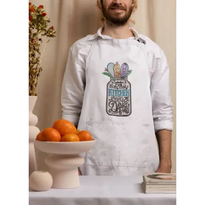 Closeup of 'In This Kitchen We Dance' embroidery design, showcasing intricate details for kitchen decor.