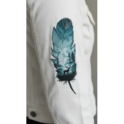 Closeup of the Feather Night Forest embroidery design showcasing intricate feather details for stitching.