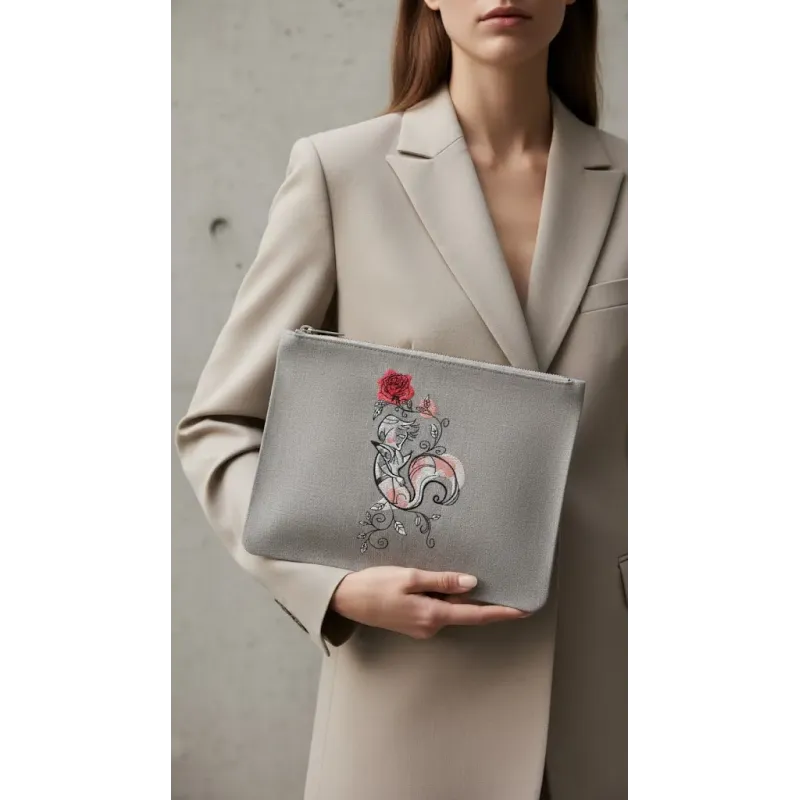 Closeup of the Little Prince fox and rose embroidery design, showcasing intricate stitching patterns for crafts.