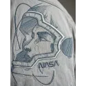 Closeup of an astronaut in a helmet embroidery design from the Fantastic World collection.