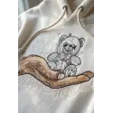 Closeup of the Crazy Teddy Bear on the Palm embroidery design, showcasing intricate stitching details for crafters.