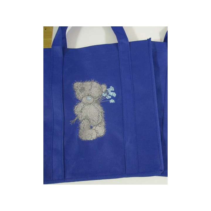 Teddy Bear with blue flower embroidery design - Embroidery Design
