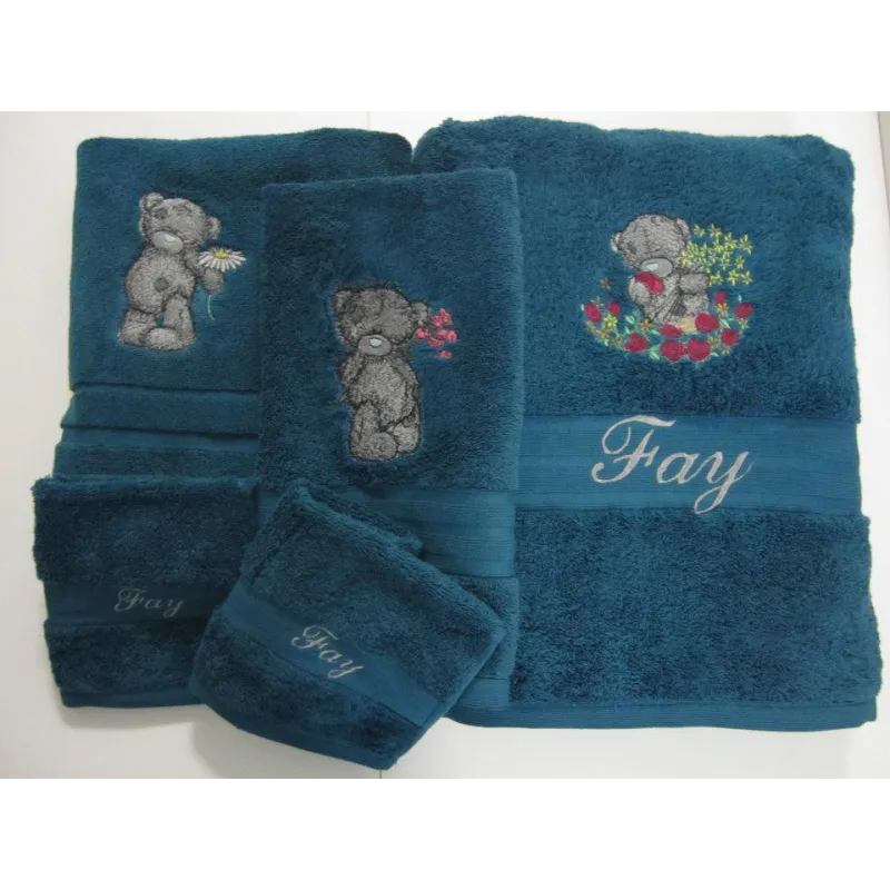 Teddy Bear with blue flower embroidery design - Embroidery Design