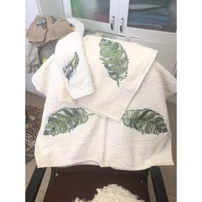 Closeup of a gorgeous feather embroidery design, showcasing intricate stitching patterns for creative projects.