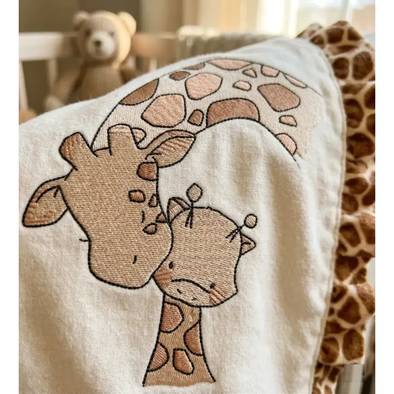 Giraffe kiss baby giraffe embroidery design preview showcasing a charming stitched motif for baby clothing.