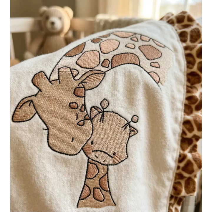 Giraffe kiss baby giraffe embroidery design preview showcasing a charming stitched motif for baby clothing.