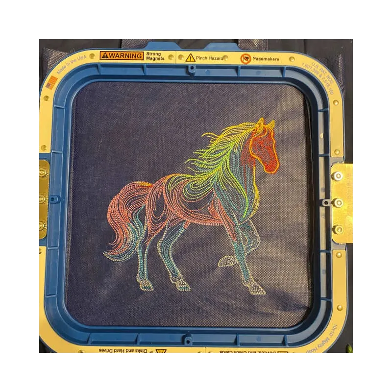 Closeup of rainbow horse sketch embroidery design showcasing intricate stitching patterns on fabric.