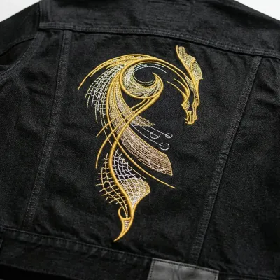 Closeup of a gold dragon embroidery design showcasing intricate details for various stitching projects.