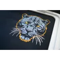 Embroidery design of a dark blue panther on a dark background, showcasing intricate stitching details.