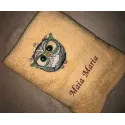 Owl wearing glasses embroidery design mockup showing detailed stitching pattern