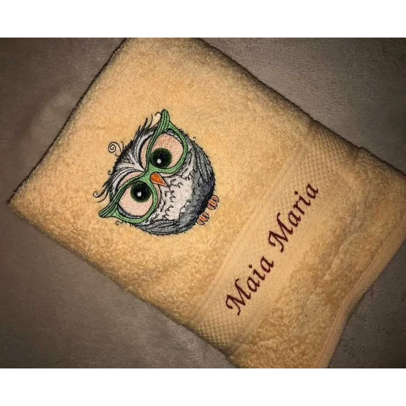 Owl wearing glasses embroidery design mockup showing detailed stitching pattern
