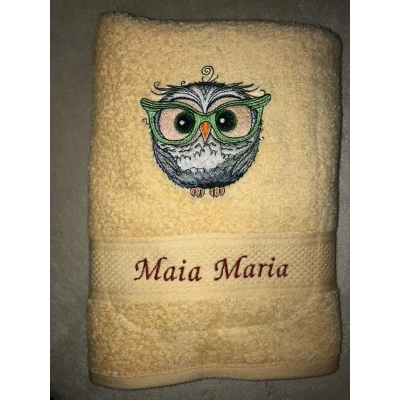Owl in glasses embroidery design preview showing stitched details