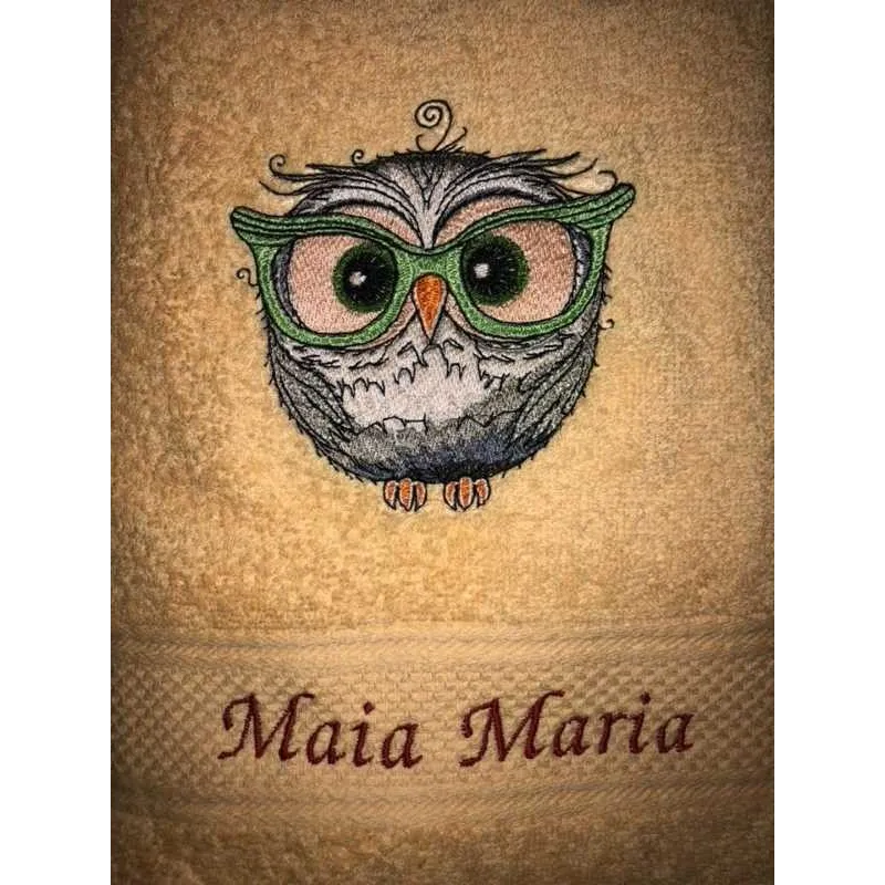 Owl in glasses embroidery design preview showing stitched detail of wise owl wearing spectacles