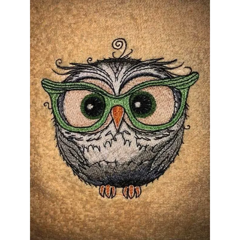 Owl wearing glasses embroidery design preview with stitched details