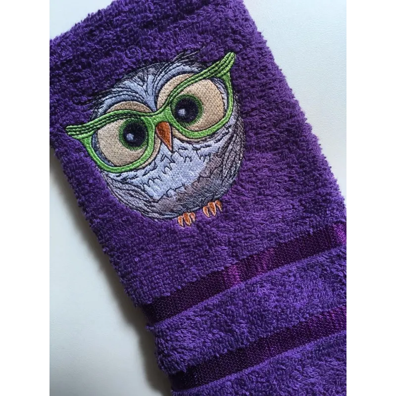 Owl in glasses embroidery design preview showing detailed stitching pattern