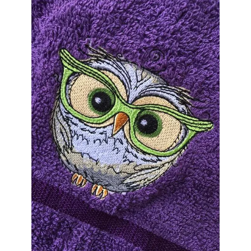 Owl wearing glasses embroidery design preview showing detailed stitching pattern