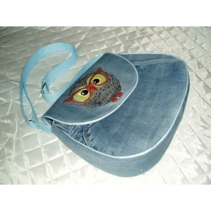 Owl in glasses embroidery design preview showing stitched pattern detail
