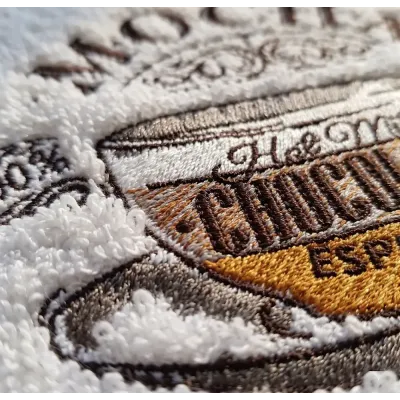 Cup of mocha embroidery design preview showing stitched coffee cup pattern